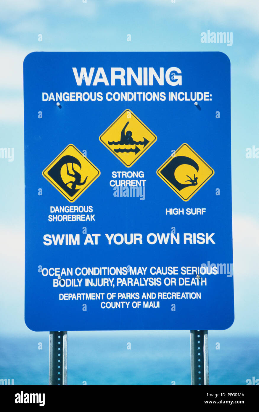 Blue sign warning of swimming hazards Stock Photo Alamy