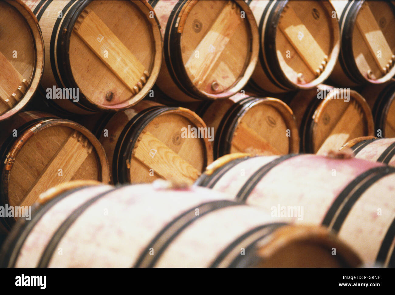 Wooden barrels stored on top of each other Stock Photo Alamy