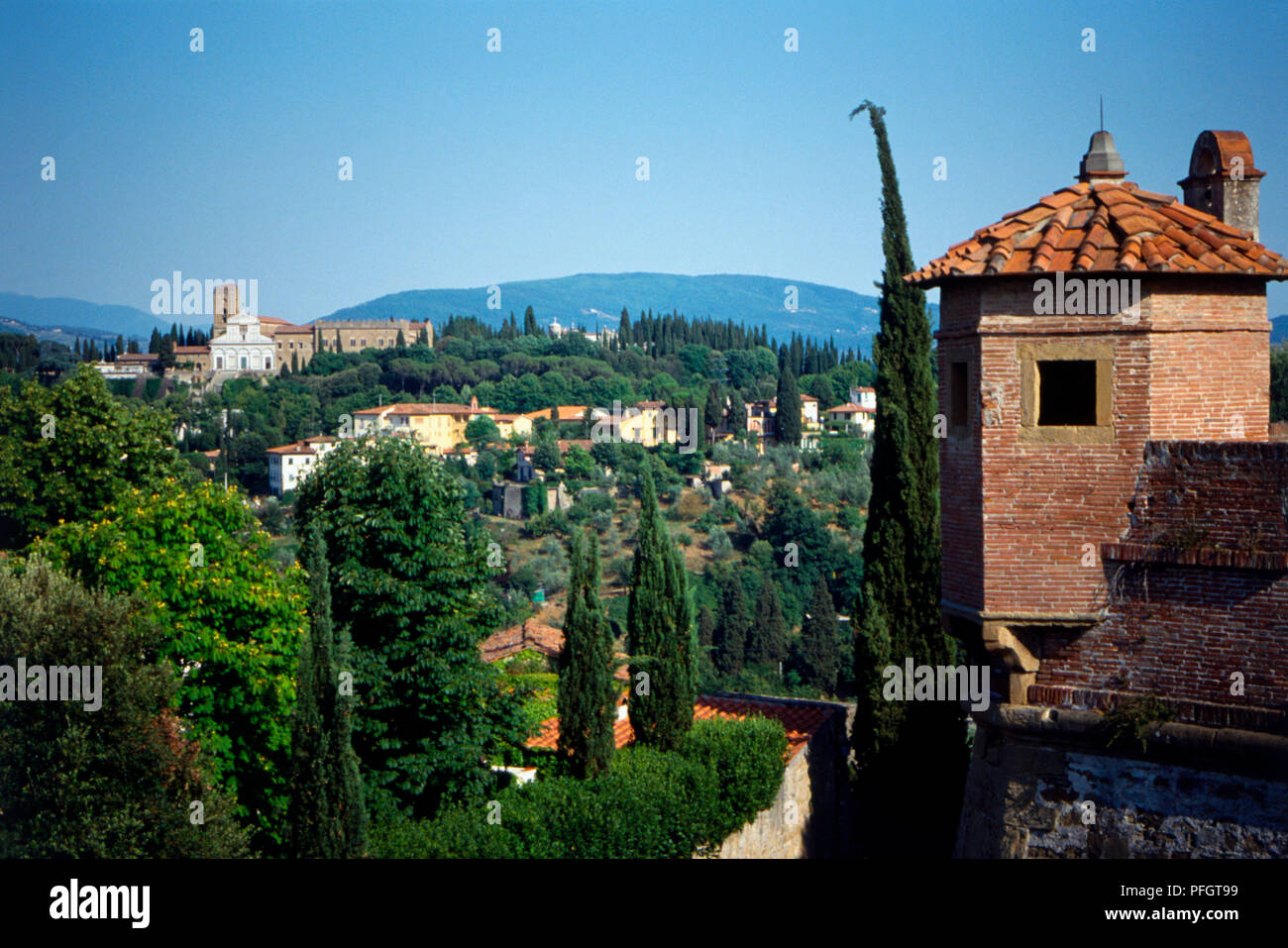 Italy, Florence, view across to San Miniato al Monte from Forte di Belvedere, with many cypress trees. Stock Photo