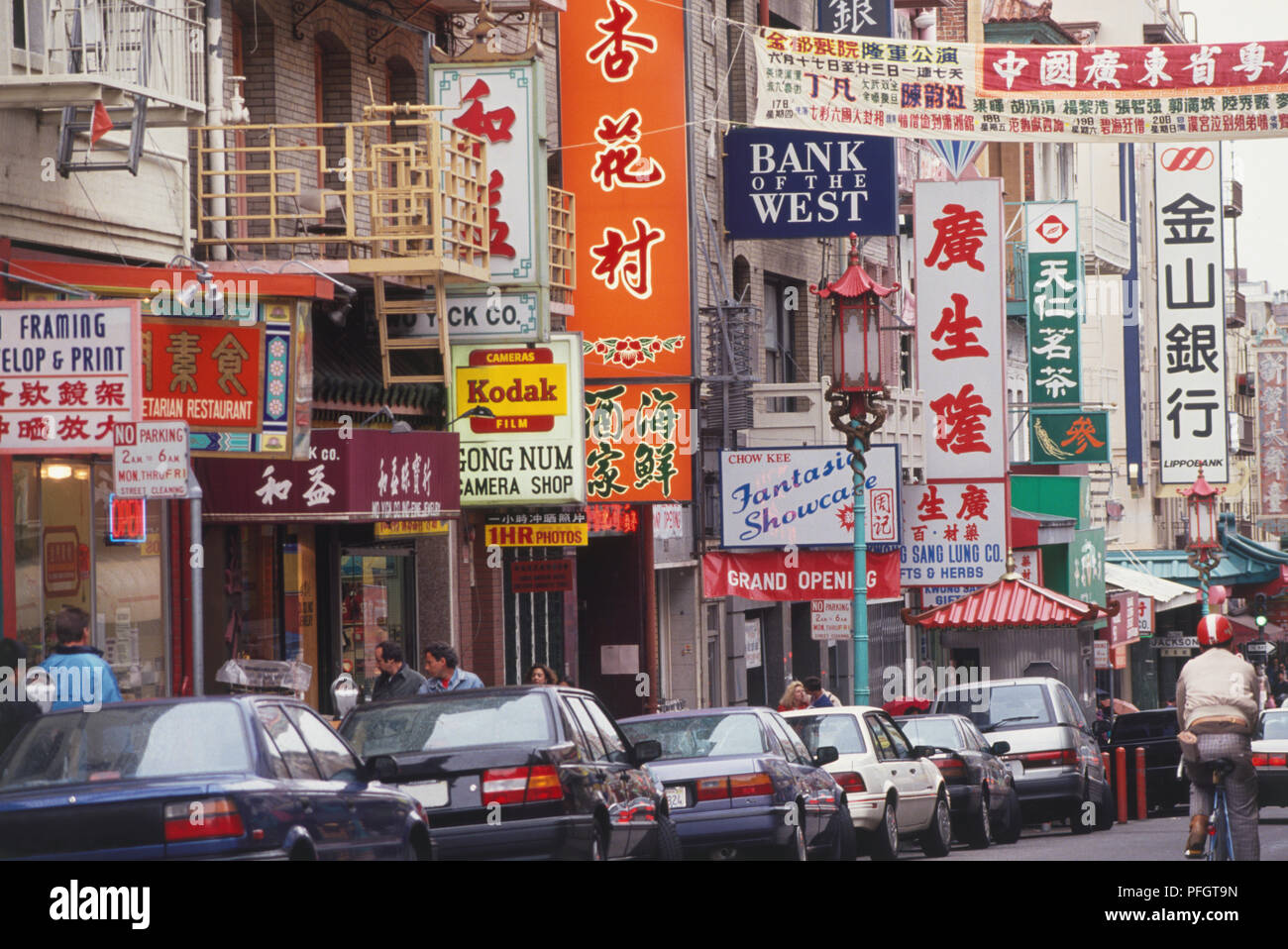 USA, California, San Francisco, Chinatown, Grant Avenue, row of shops and restaurants with signs and banners in Chinese. Stock Photo