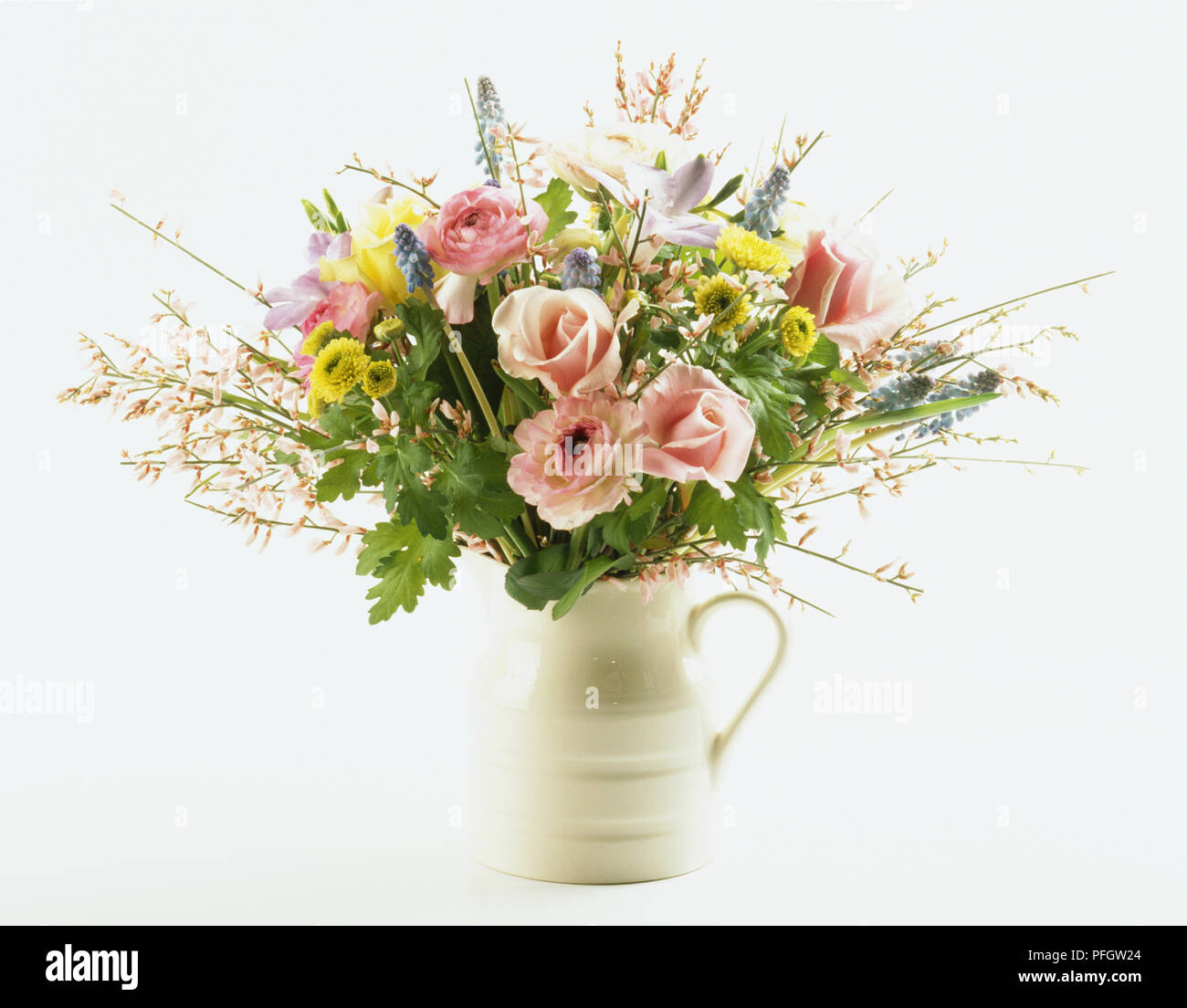 Seasonal pink country garden flowers in a jug Stock Photo Alamy