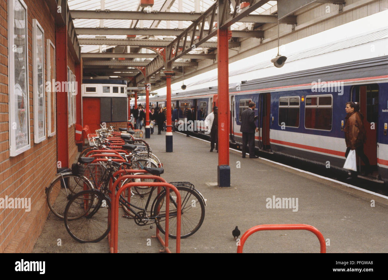 Bicycle parking area on the platform of a railway station Stock Photo