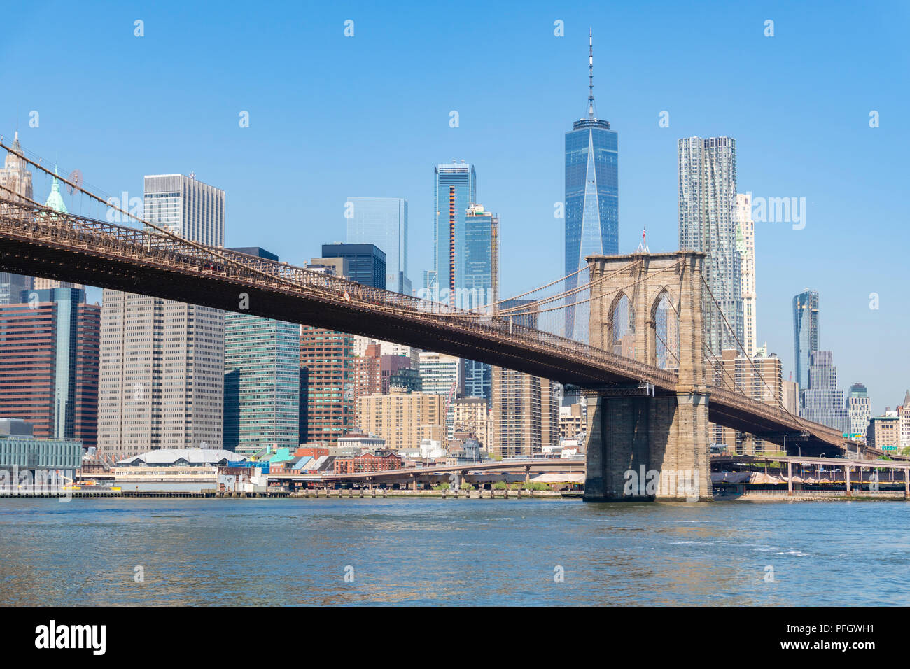Manhattan skyline and Brooklyn Bridge in daytime Stock Photo