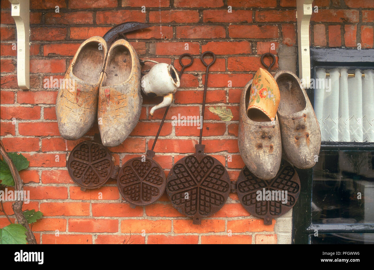 Holland, Monnickendam, wooden clogs outside restored fisherman's cottage. Stock Photo