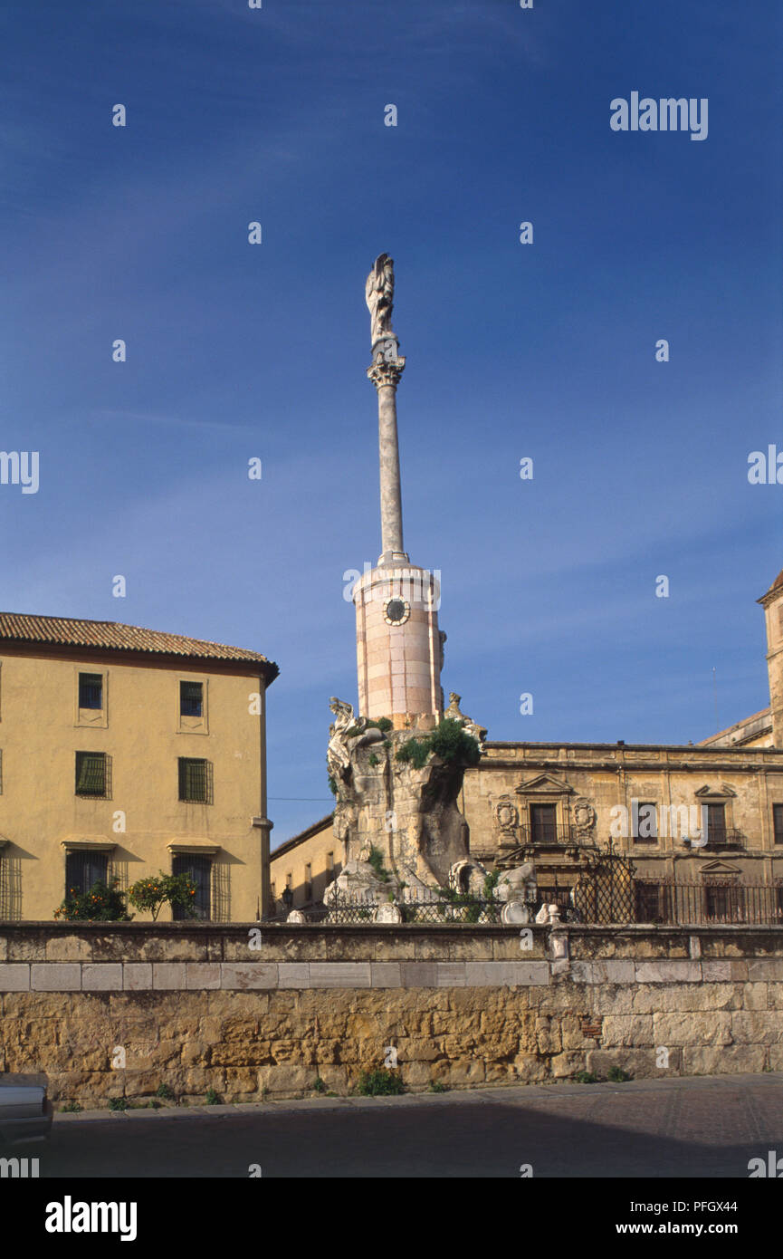 Spain, Andalusia, Cordoba, eighteenth century statue of Saint on Column, Triunfo de San Rafael, St Raphael the city patron saint. Stock Photo