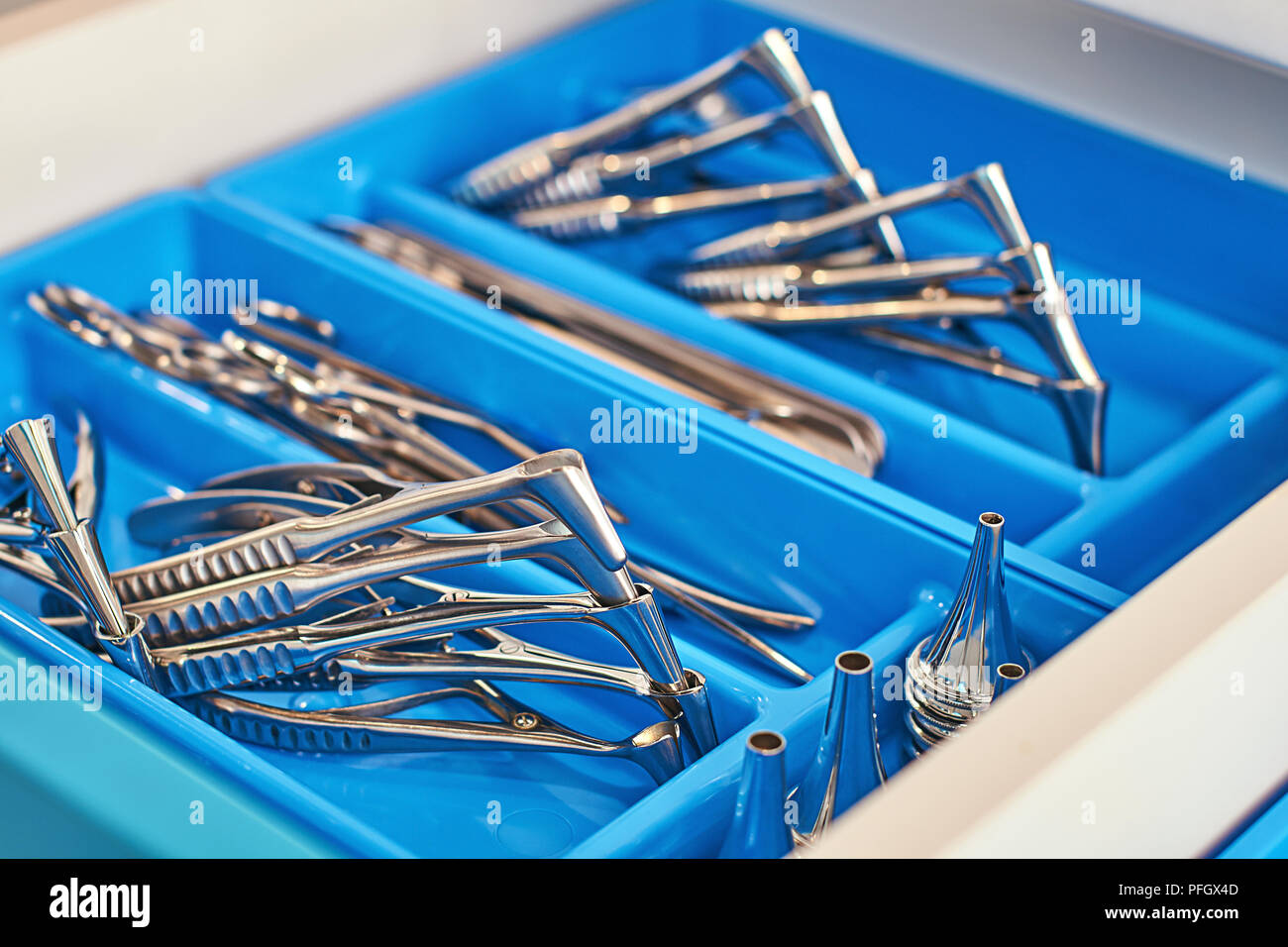 Otorhinolaryngology or ENT surgery instruments in a blue medical box