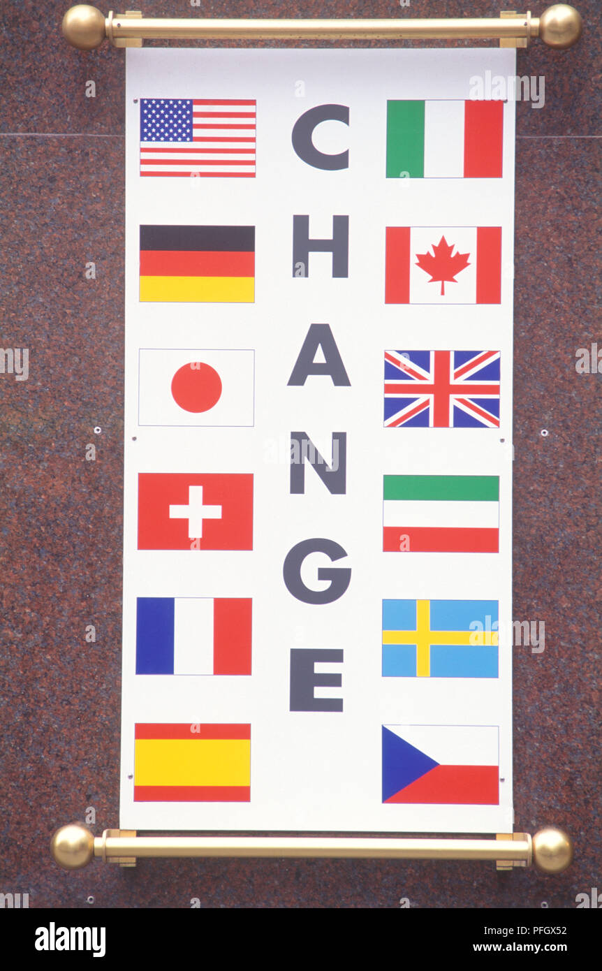Currency exchange sign with various flag symbols Stock Photo - Alamy