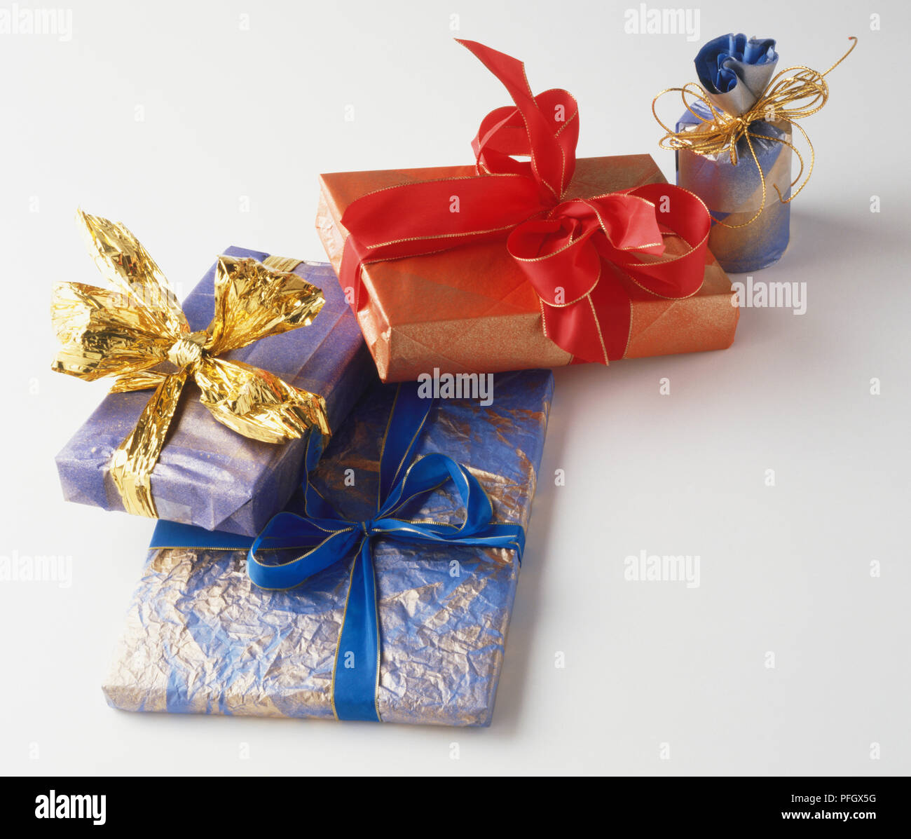 Four wrapped presents, using different coloured wrapping paper and