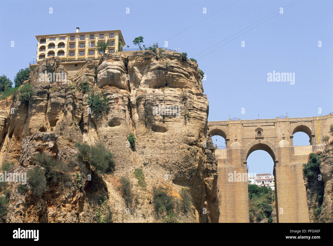 Spain, Andalusia, eighteenth century bridge, Puente Nuevo, over a gorge to a town on rock. Stock Photo