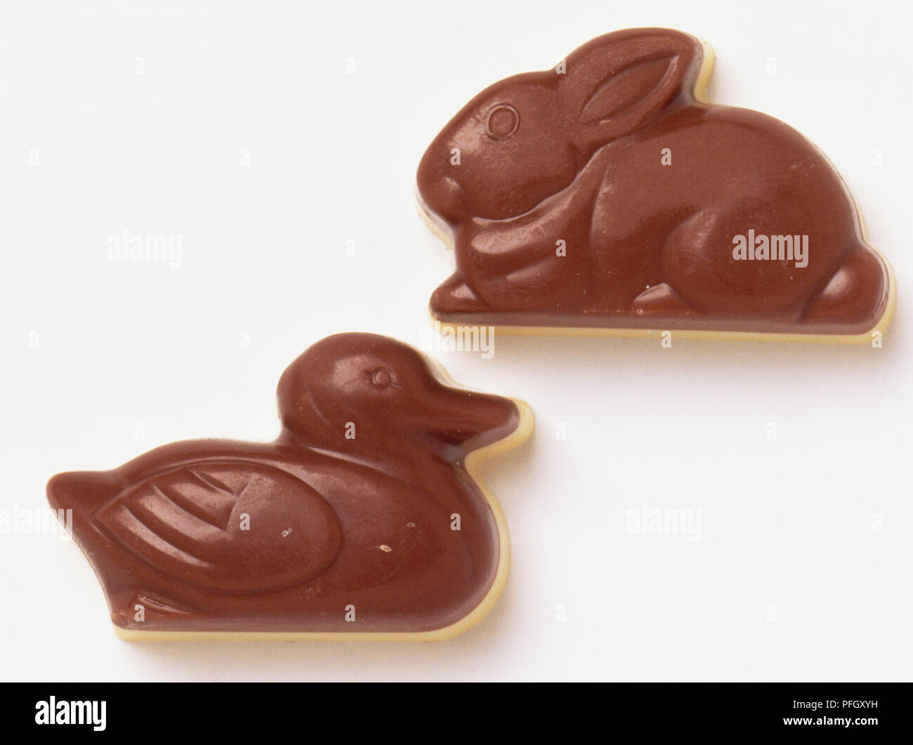 Two chocolate animals. A bunny and a duck. Stock Photo
