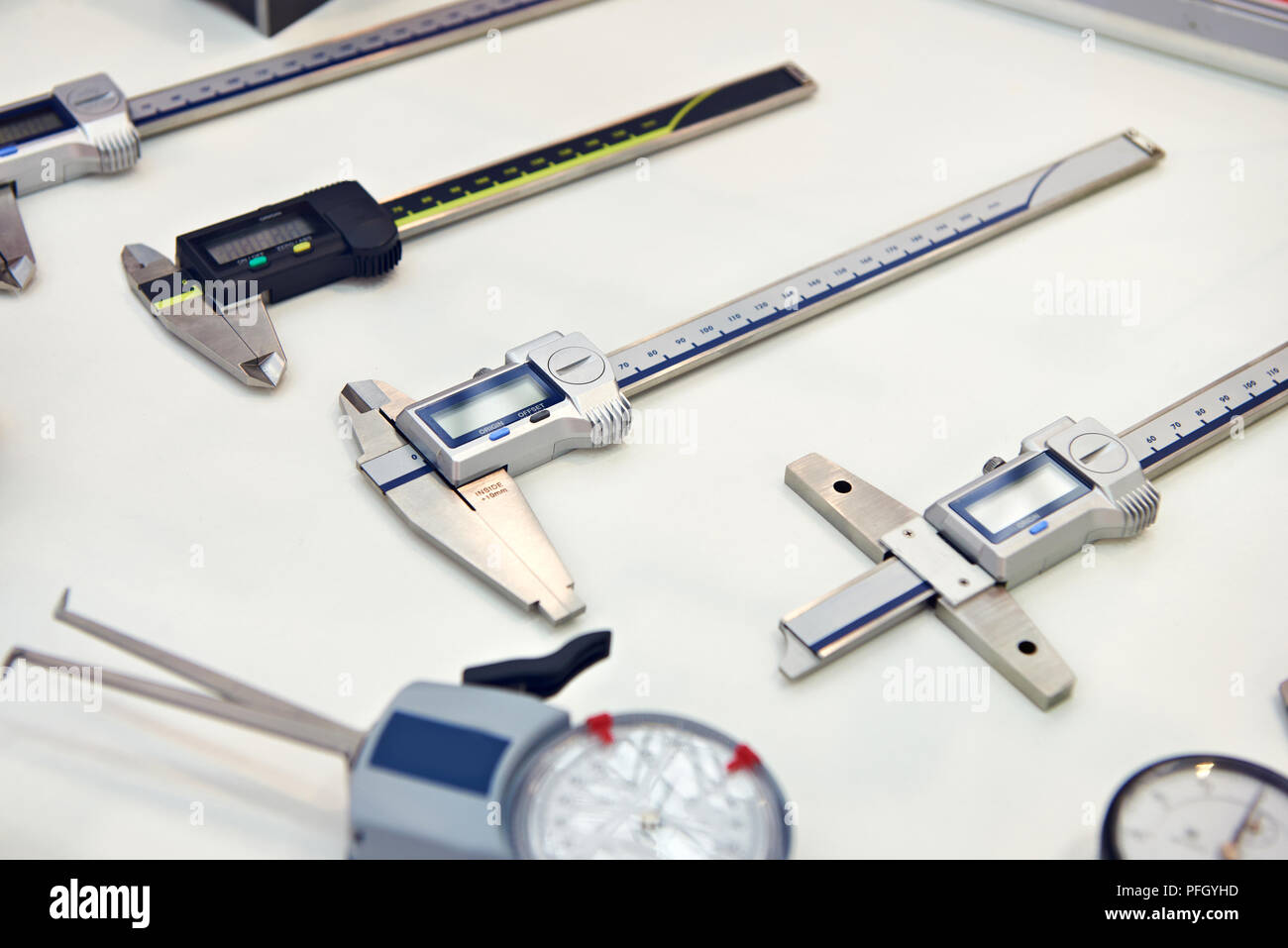 Digital calipers on white background in store Stock Photo