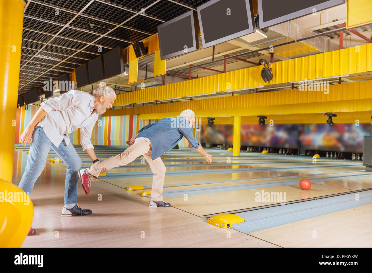 Nice positive elderly men having fun at day Stock Photo