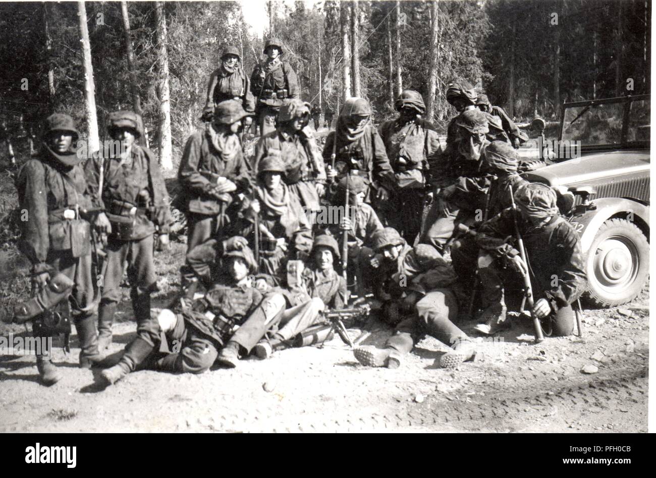 German Soldiers in Camouflage Smocks from the 6th SS Mountain Division Nord in 1941. This Division performed so poorly during the initial stages of operation Barbarossa that it needed retraining , This is a private photo by member of this unit Stock Photo