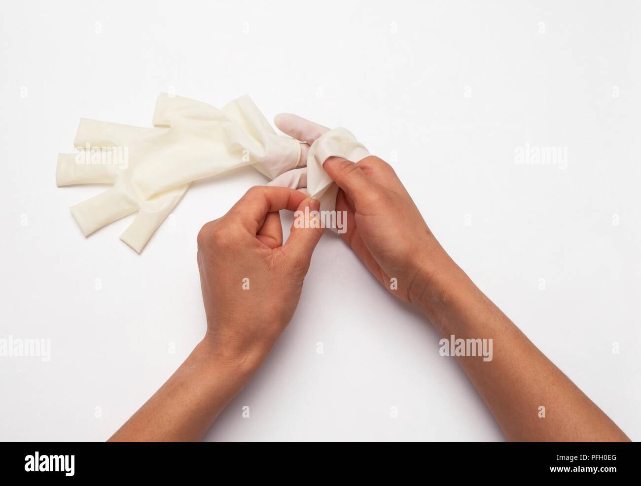 Removing surgical gloves, closeup Stock Photo Alamy
