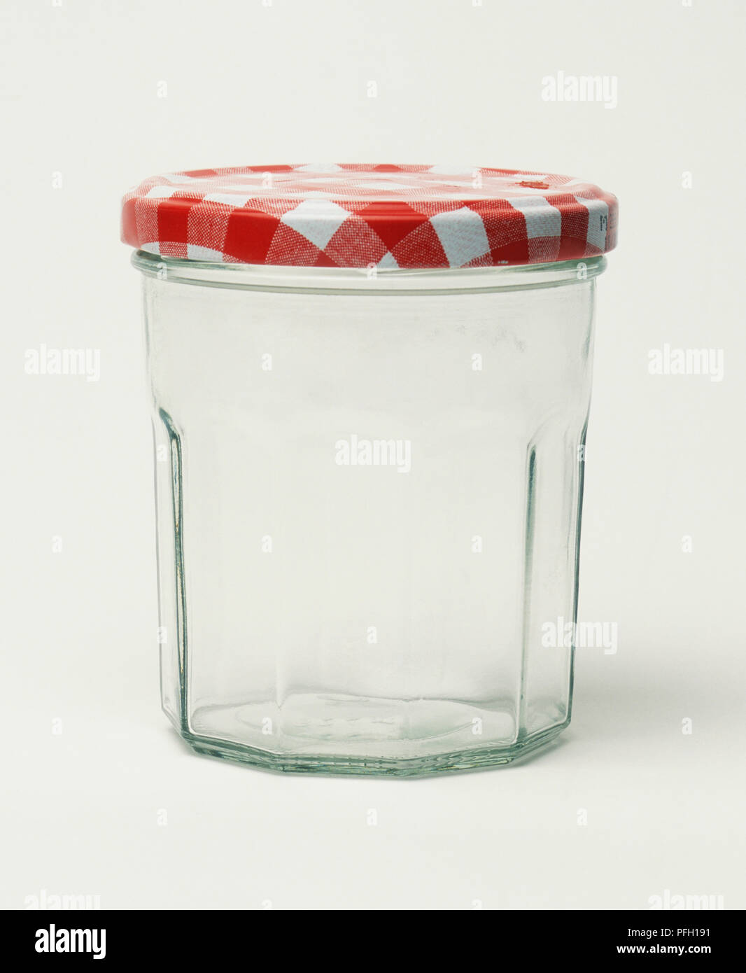 Glass jar with red and white metal lid Stock Photo Alamy