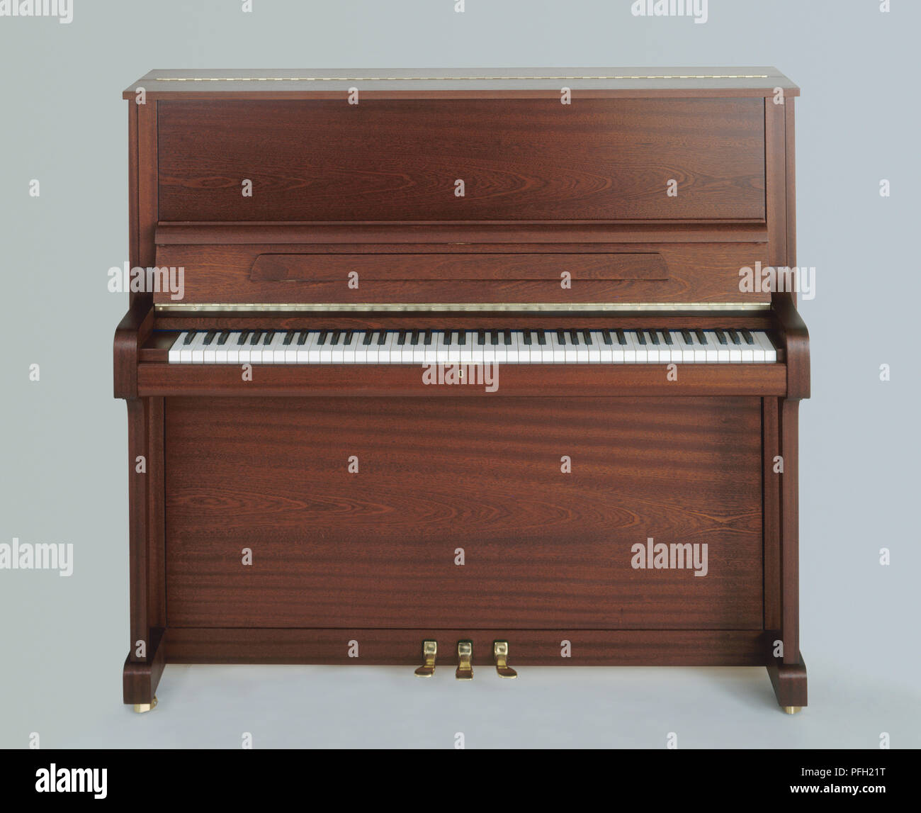 Upright piano, front view Stock Photo - Alamy