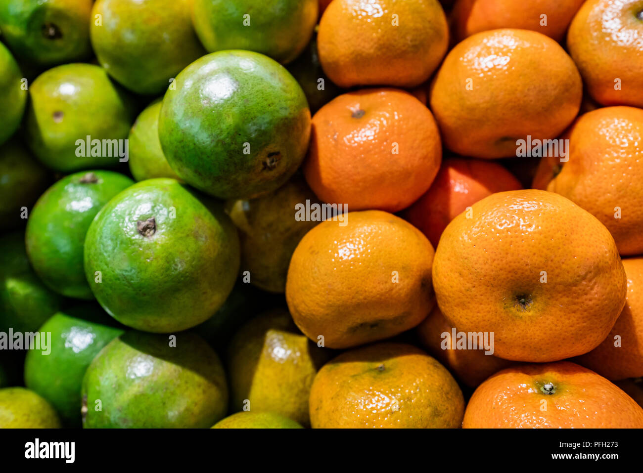 Fresh, bright, sweet Green and Mandarin Orange background Stock Photo