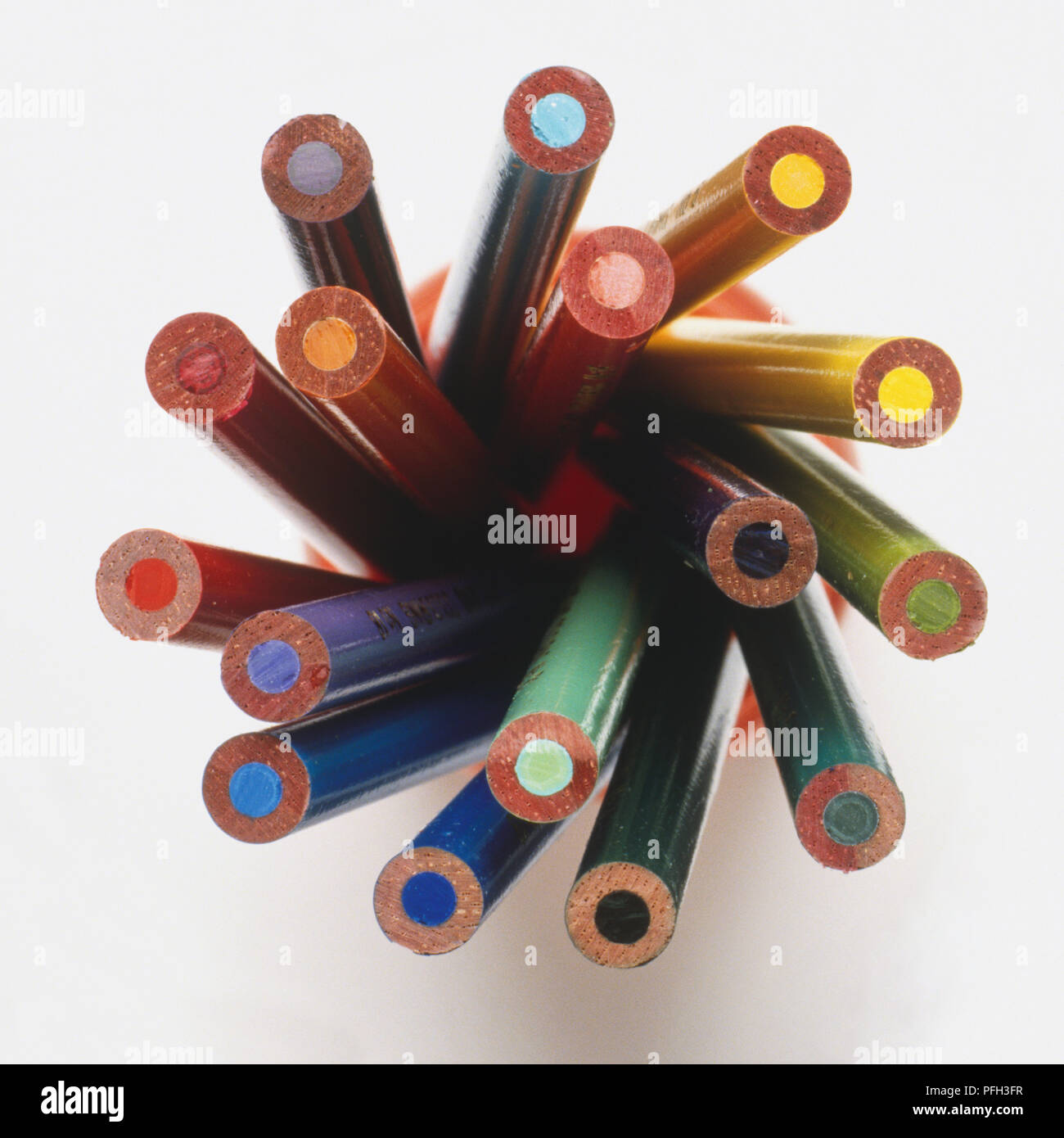 Coloured pencils in pencil holder, close-up Stock Photo