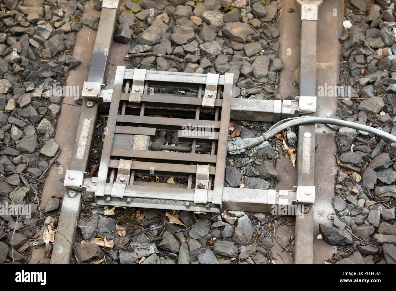 A switching mechanism between railway tracks Stock Photo Alamy