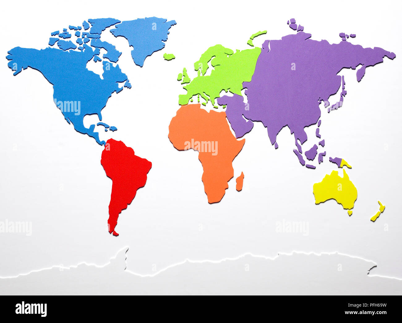 Colours On A Map Model Of World Map Depicting Continents In Different Colours Stock Photo -  Alamy