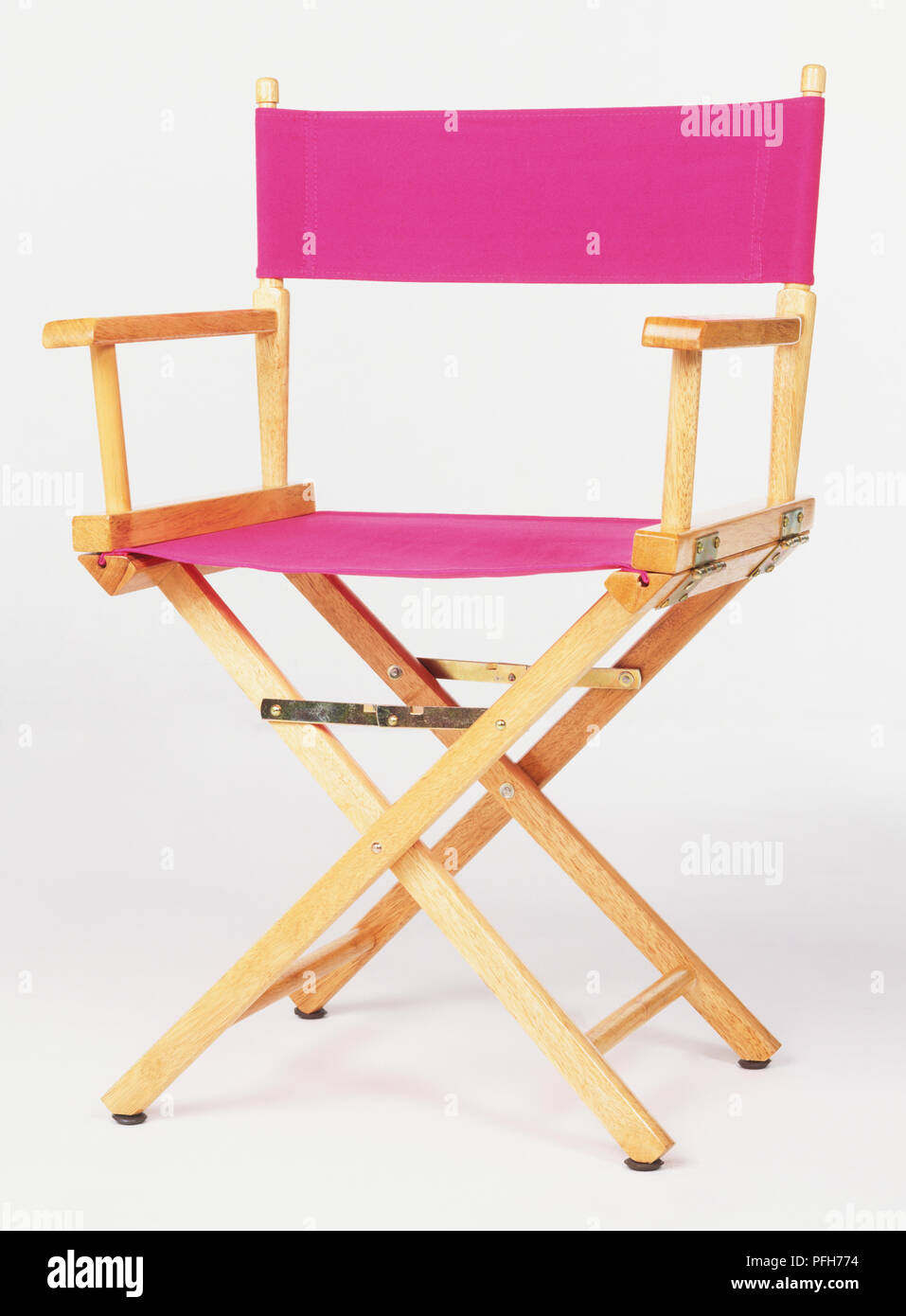Director's chair with pink canvas seat Stock Photo Alamy