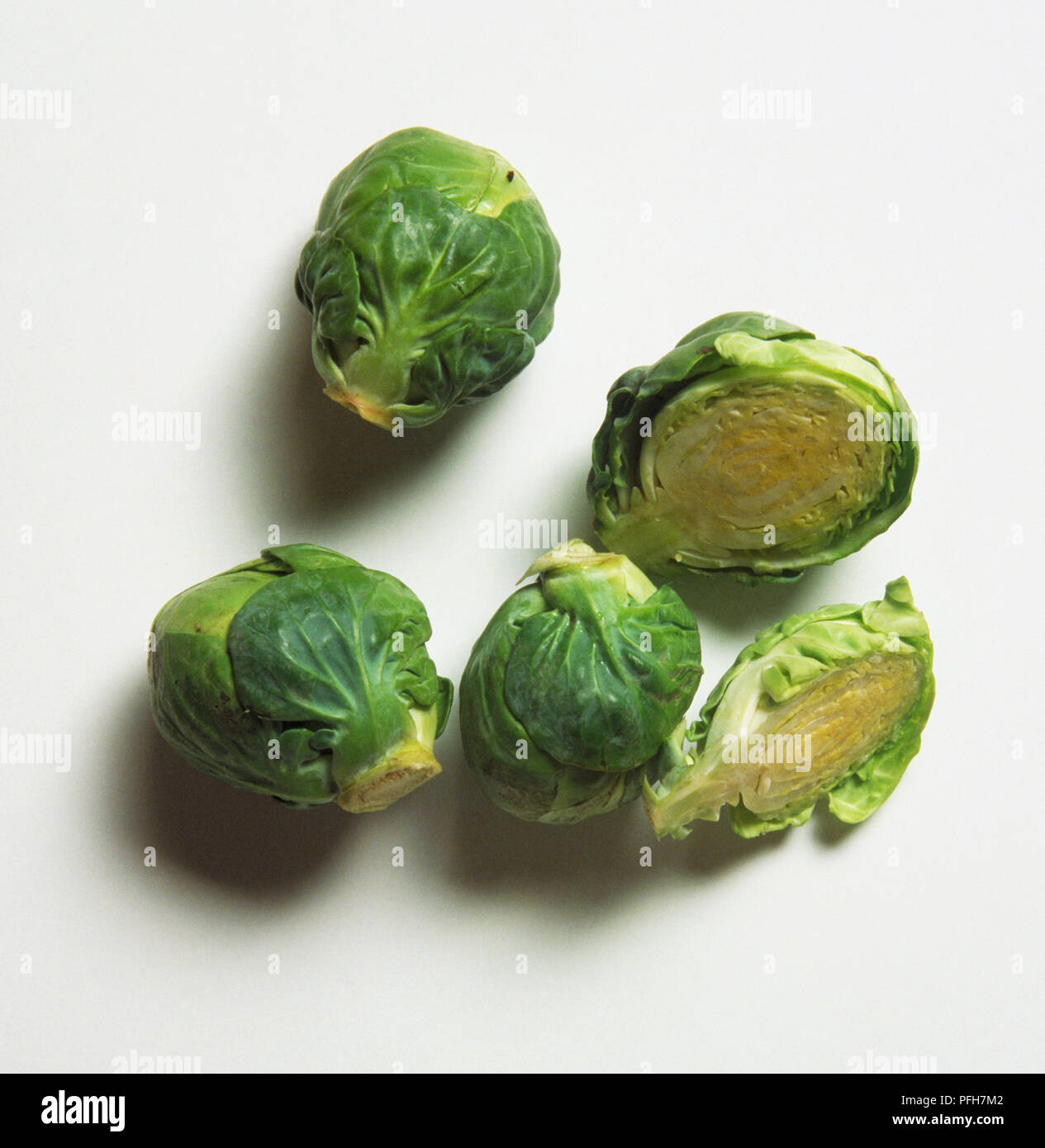 Brussels Sprouts, whole and cut in half Stock Photo Alamy