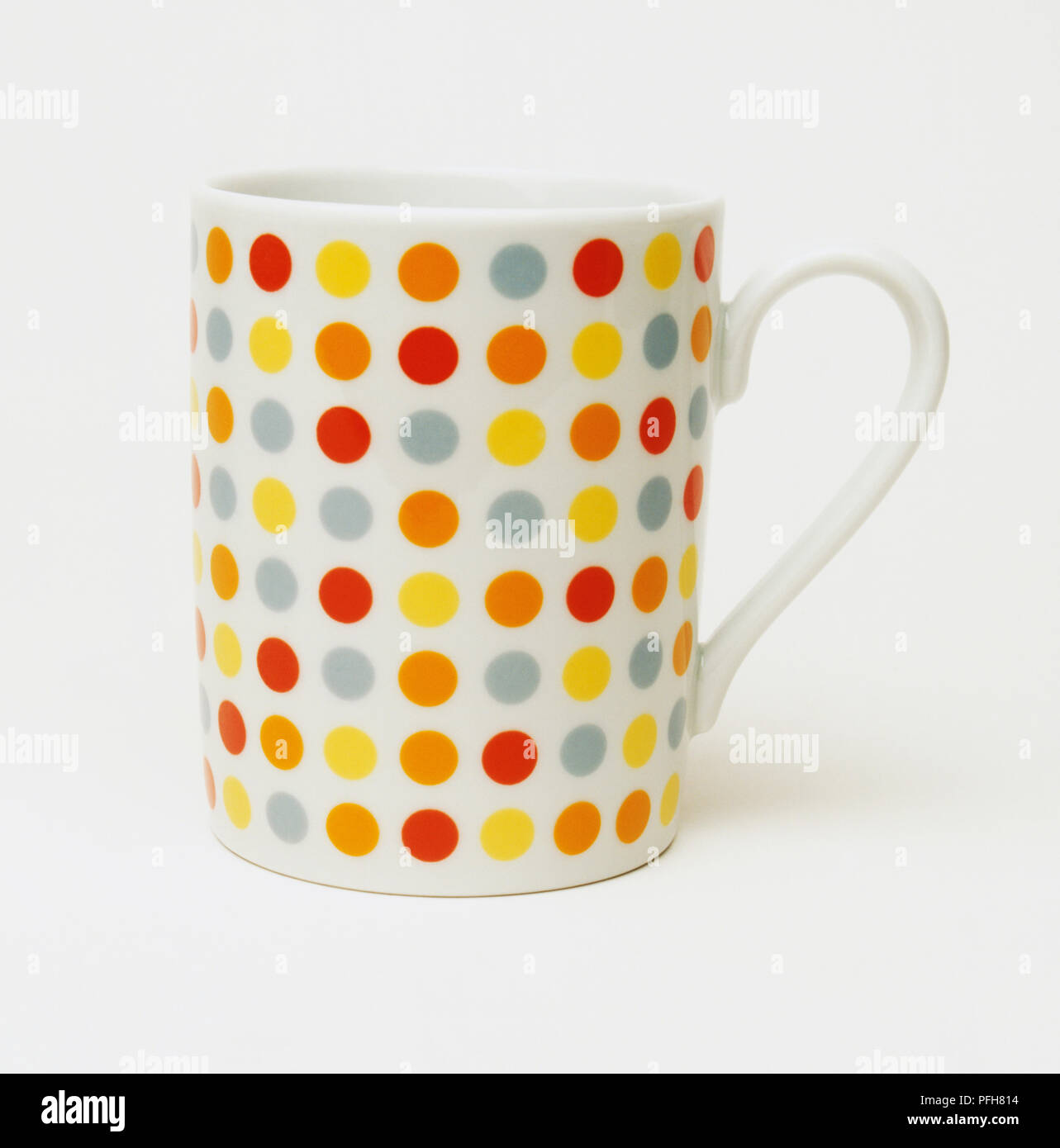 A mug showing design of colourful dots Stock Photo