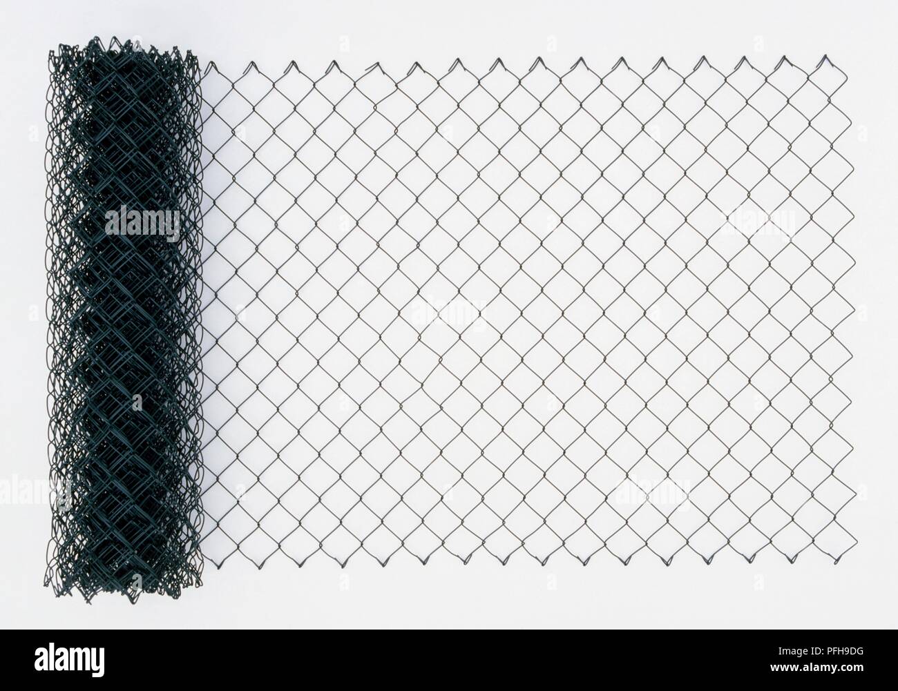 Roll of chain link fencing Stock Photo