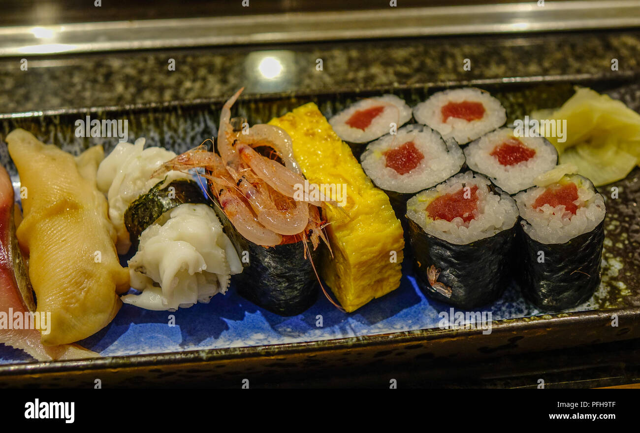 Sushi set at a rotating conveyor belt restaurant in Tokyo, Japan Stock