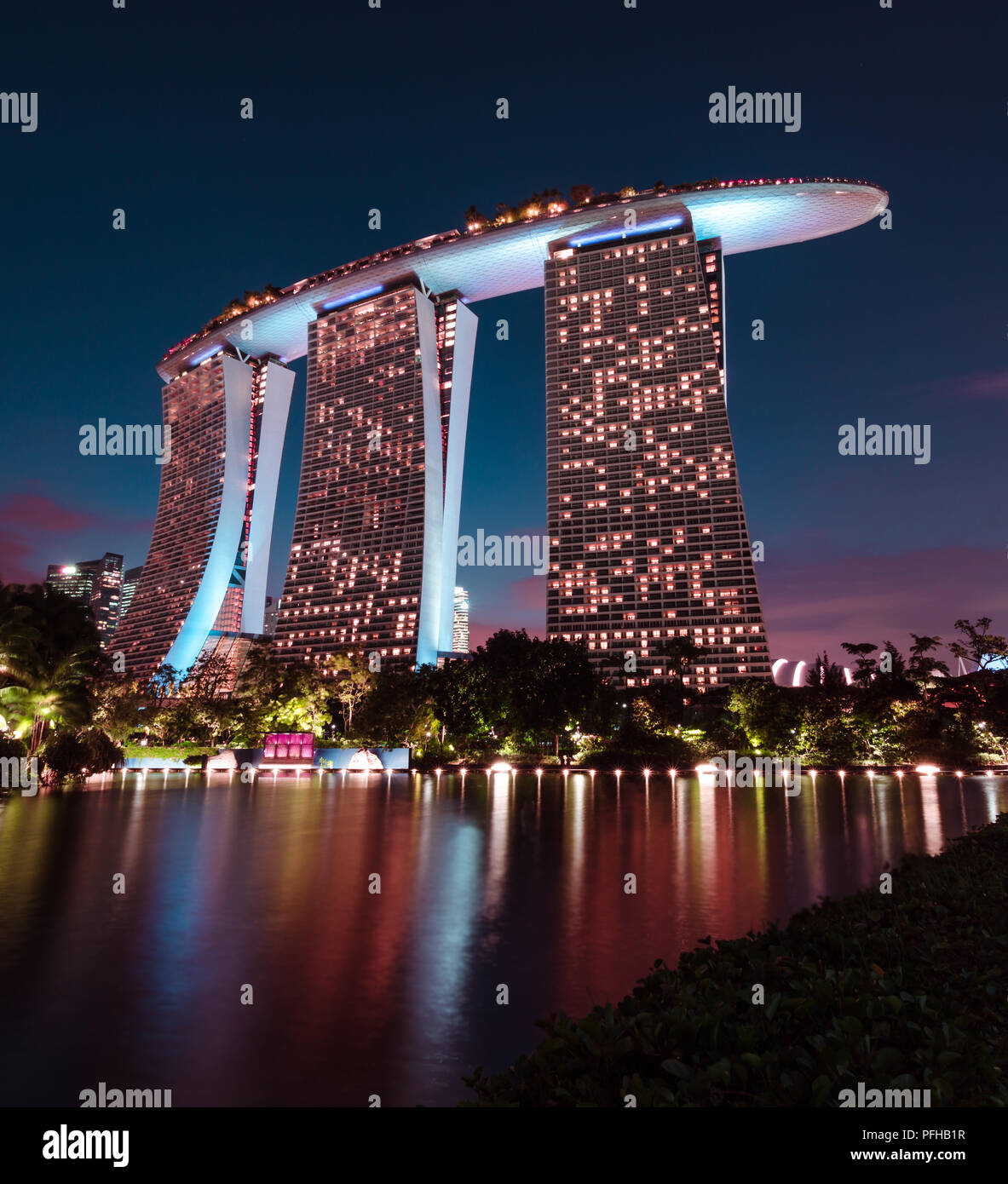 Night view of the Marina Bay Sands Hotel taken from Gardens by the Bay. Stock Photo