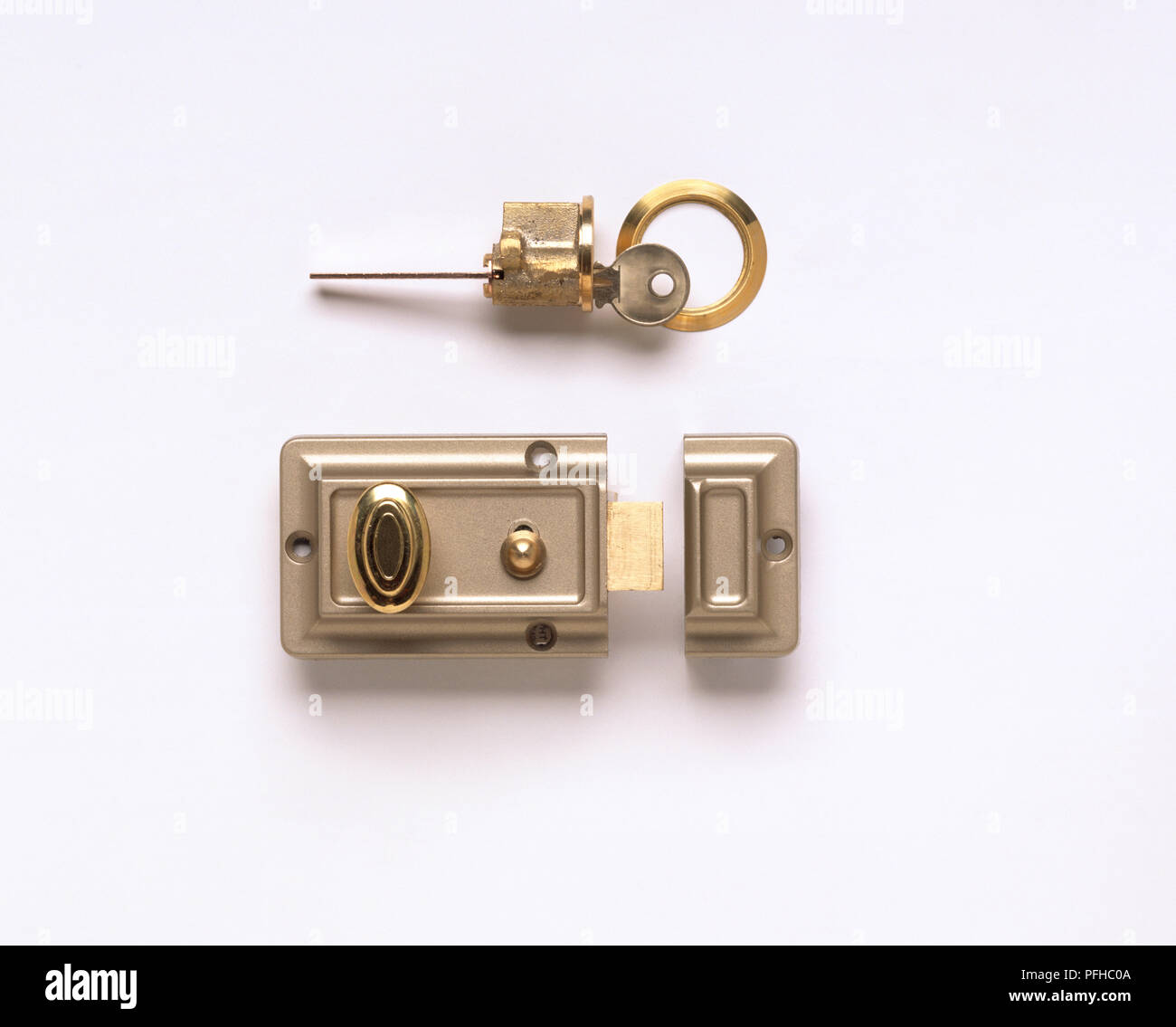 Deadbolt door lock and key Stock Photo - Alamy
