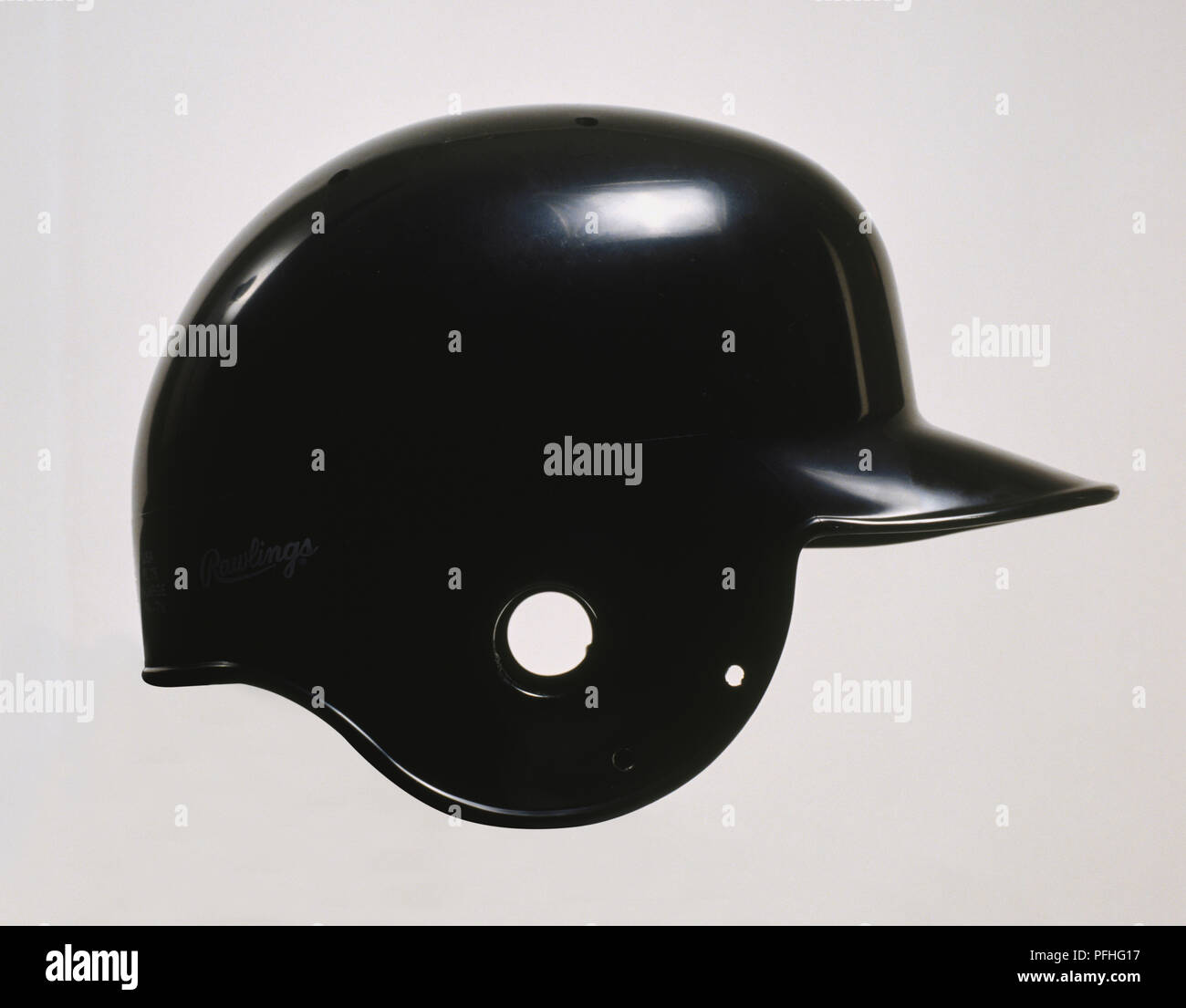 Black helmet viewed from the side. Stock Photo
