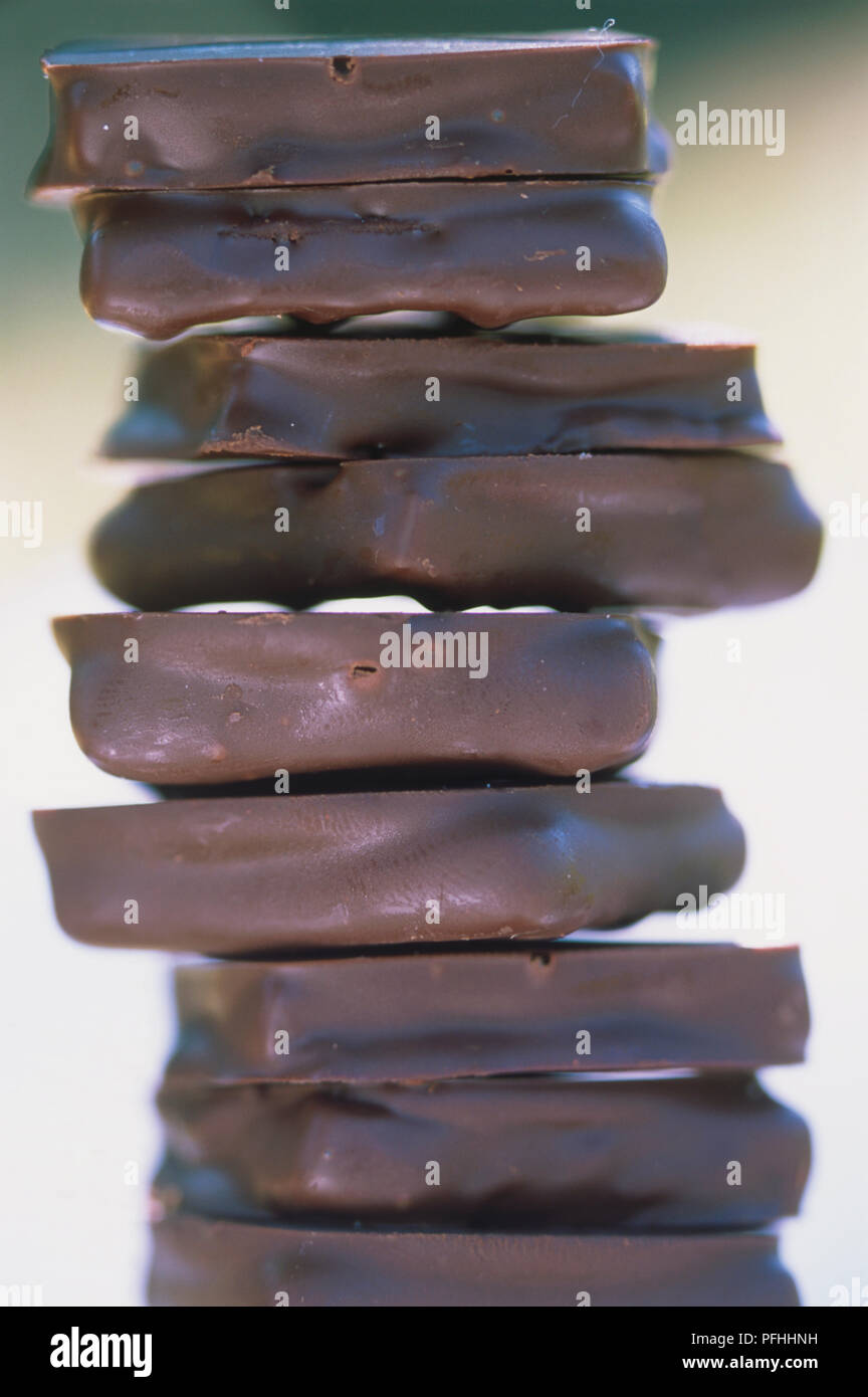 France, tall stack of dark chocolate pieces, close up Stock Photo - Alamy