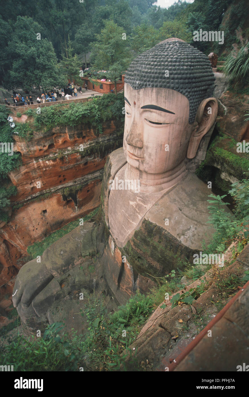 China, Sichuan, Le Shan, Lingyun Hill, Dafo or Great Buddha, enormous Buddha statue carved into the red sandstone, elevated view. Stock Photo