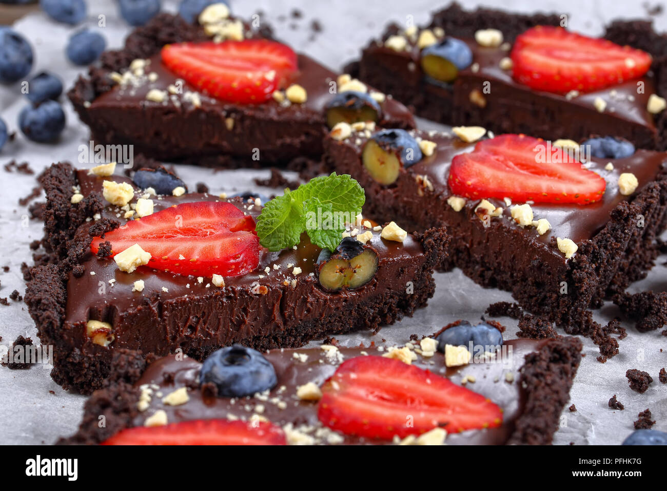 Close Up Of Slices No Bake Chocolate Cake Tart With Fresh
