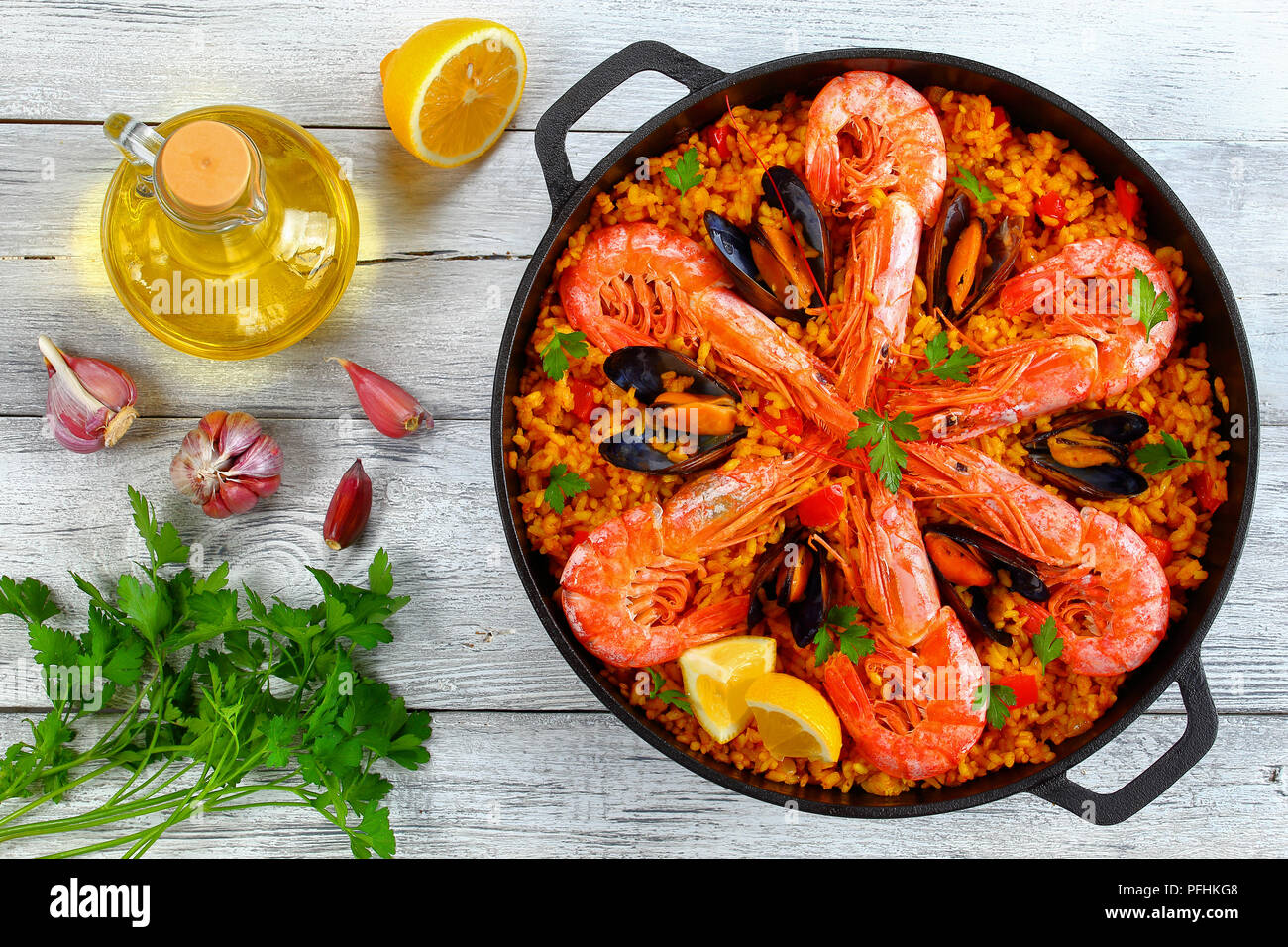 delicious seafood valencia paella with king prawns, mussels on savory