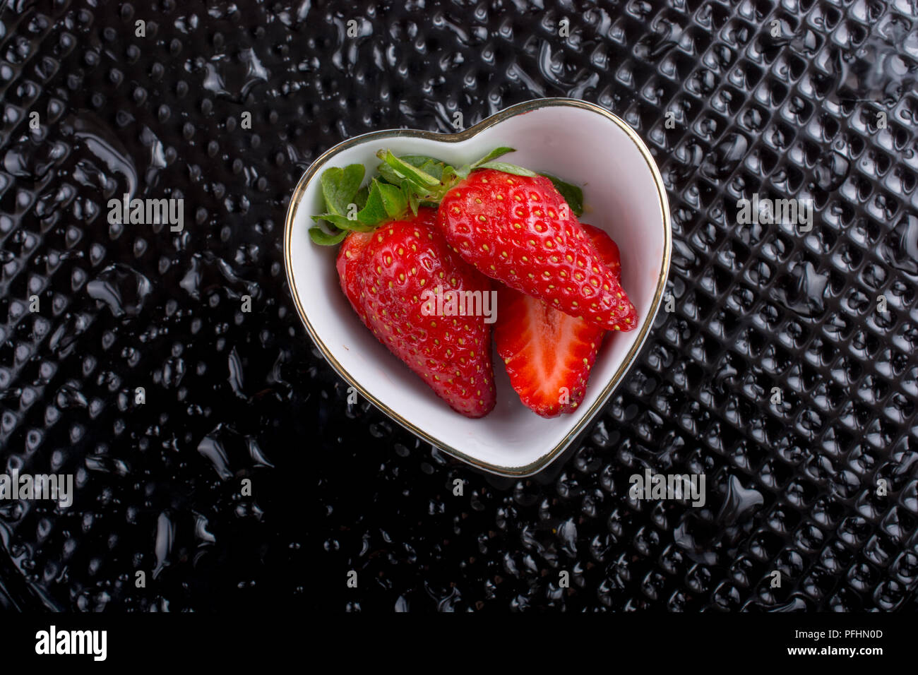 Juicy, sweet and ripe strawberry fruit in a bowl Stock Photo - Alamy