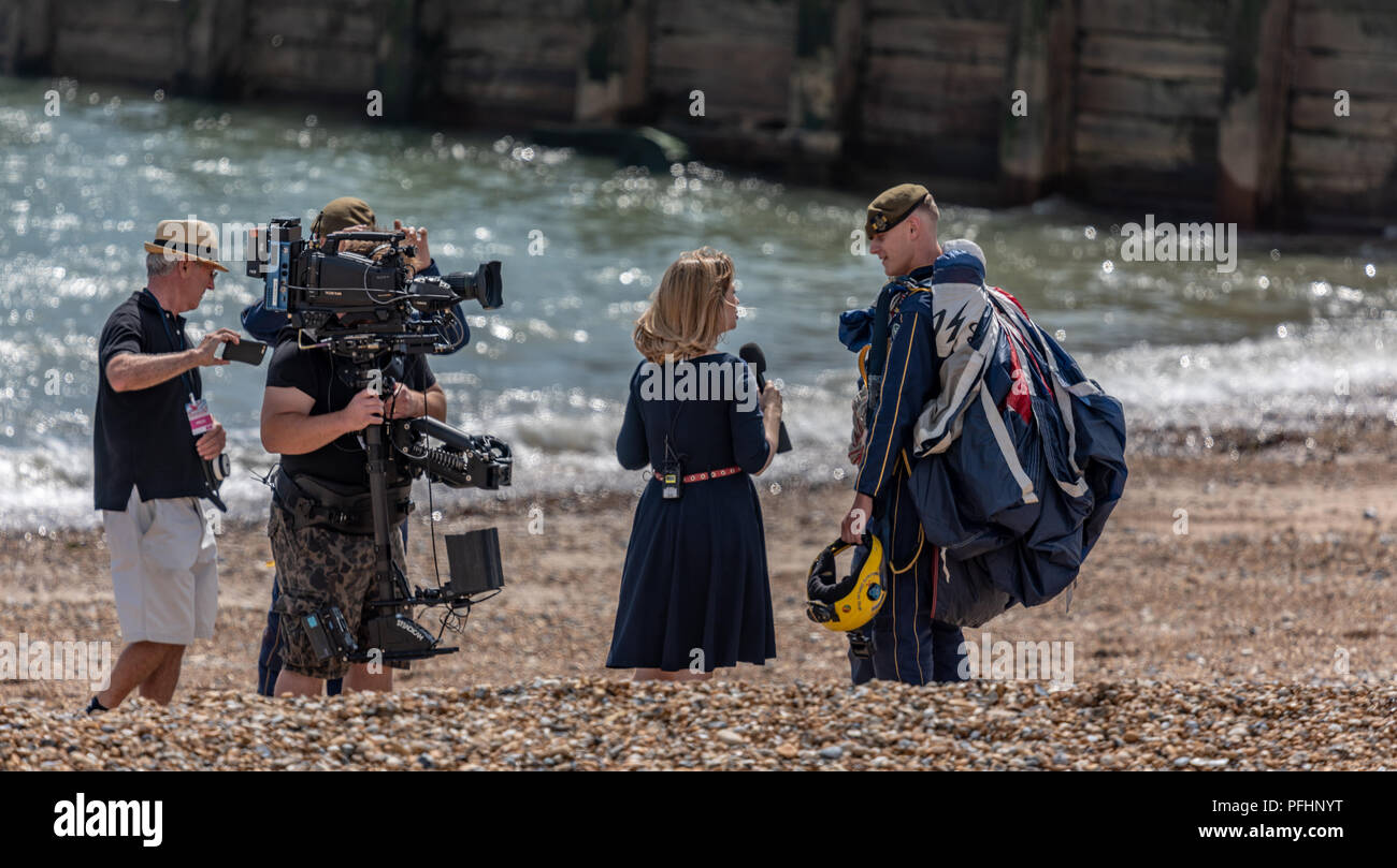 The BBC South Today team in action on the beach at Eastbourne Airbourne Stock Photo
