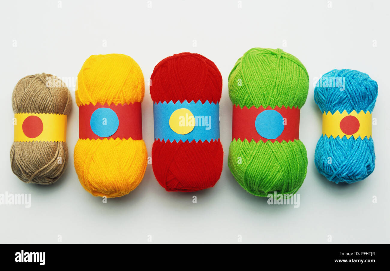 Five balls of coloured wool. Stock Photo