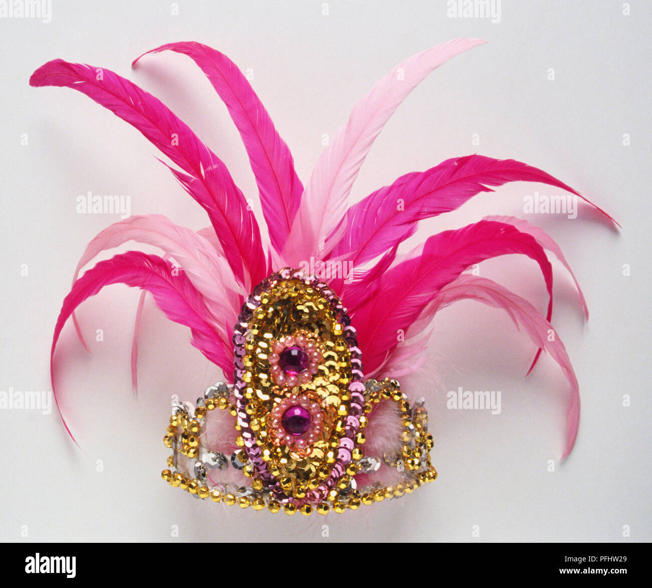 Masculinidad Seguro Caucho Golden tiara with pink feathers, front view Stock Photo - Alamy