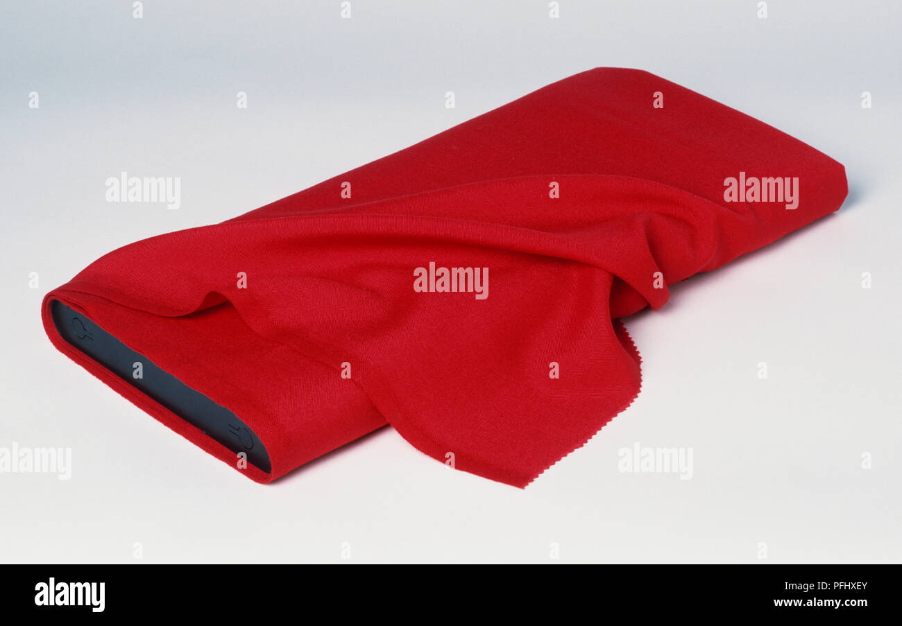 Roll of red fabric, front view. Stock Photo