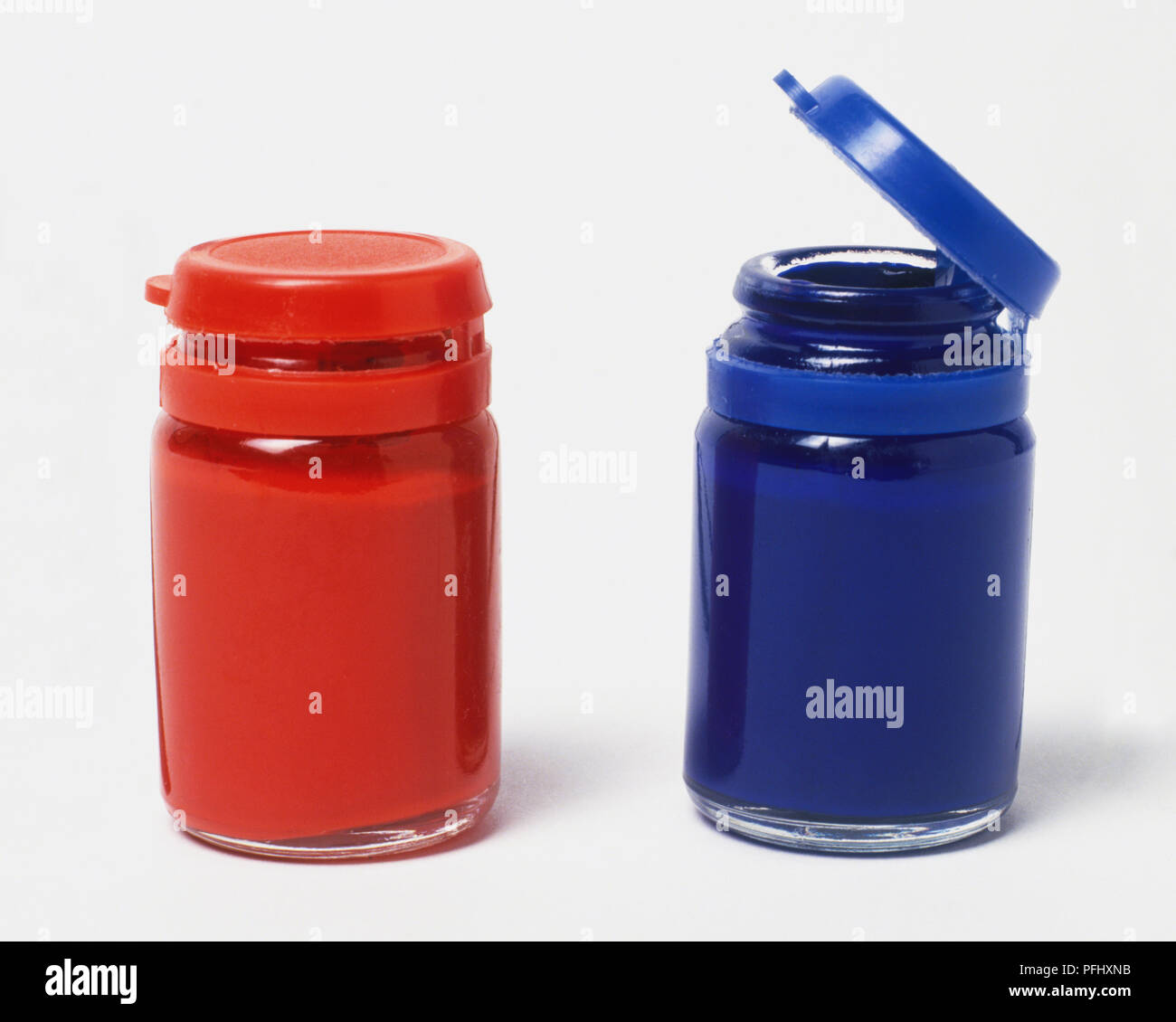 Small Pots Of Blue And Red Paint Close Up Stock Photo Alamy