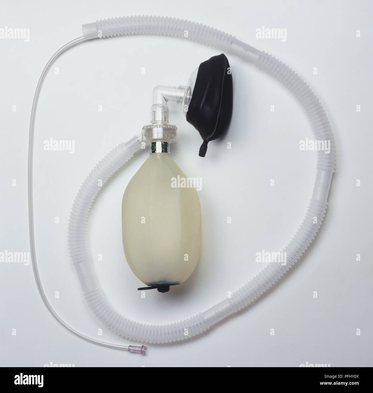 Oxygen mask attached to tube and breathing apparatus. Stock Photo