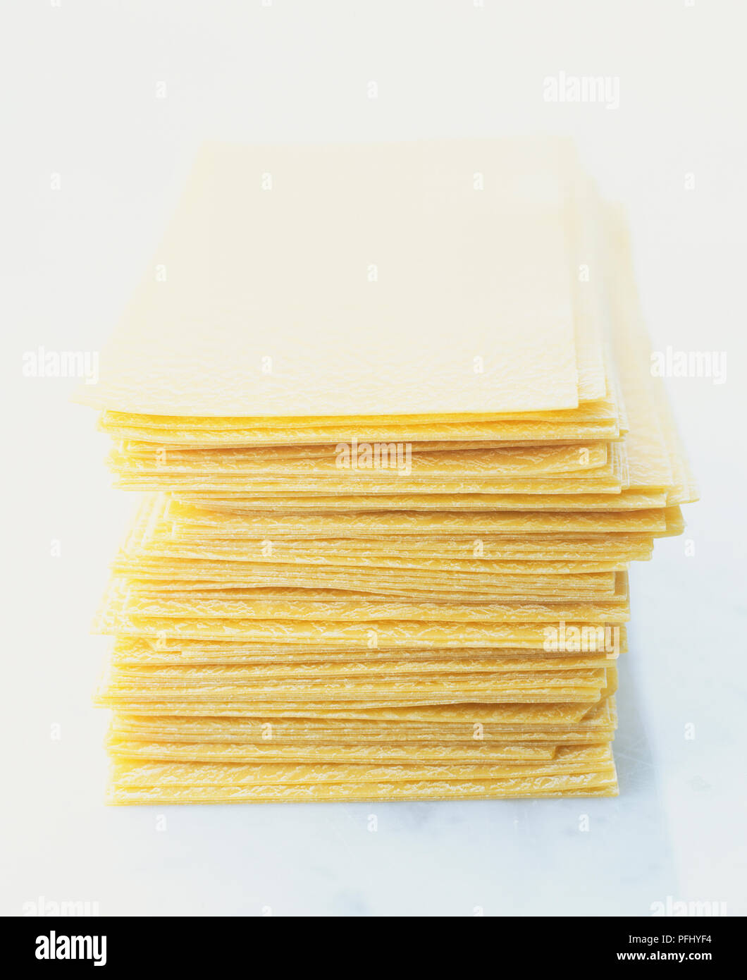 Stacked dry pasta sheets, close up Stock Photo Alamy