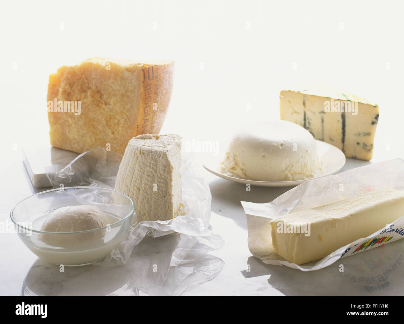 Selection of cheeses, blocks of Parmesan, Goats Cheese, Mozzarella, Pecorino, Romano