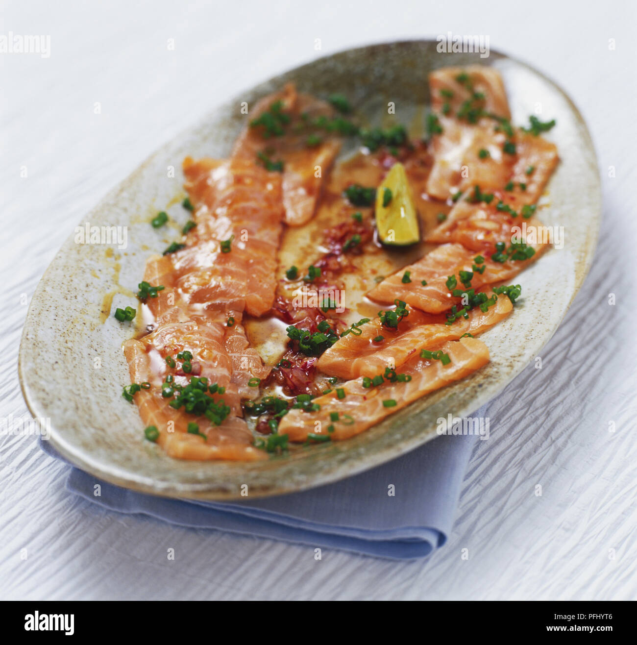 Salmon carpaccio with yuzu, close up Stock Photo Alamy