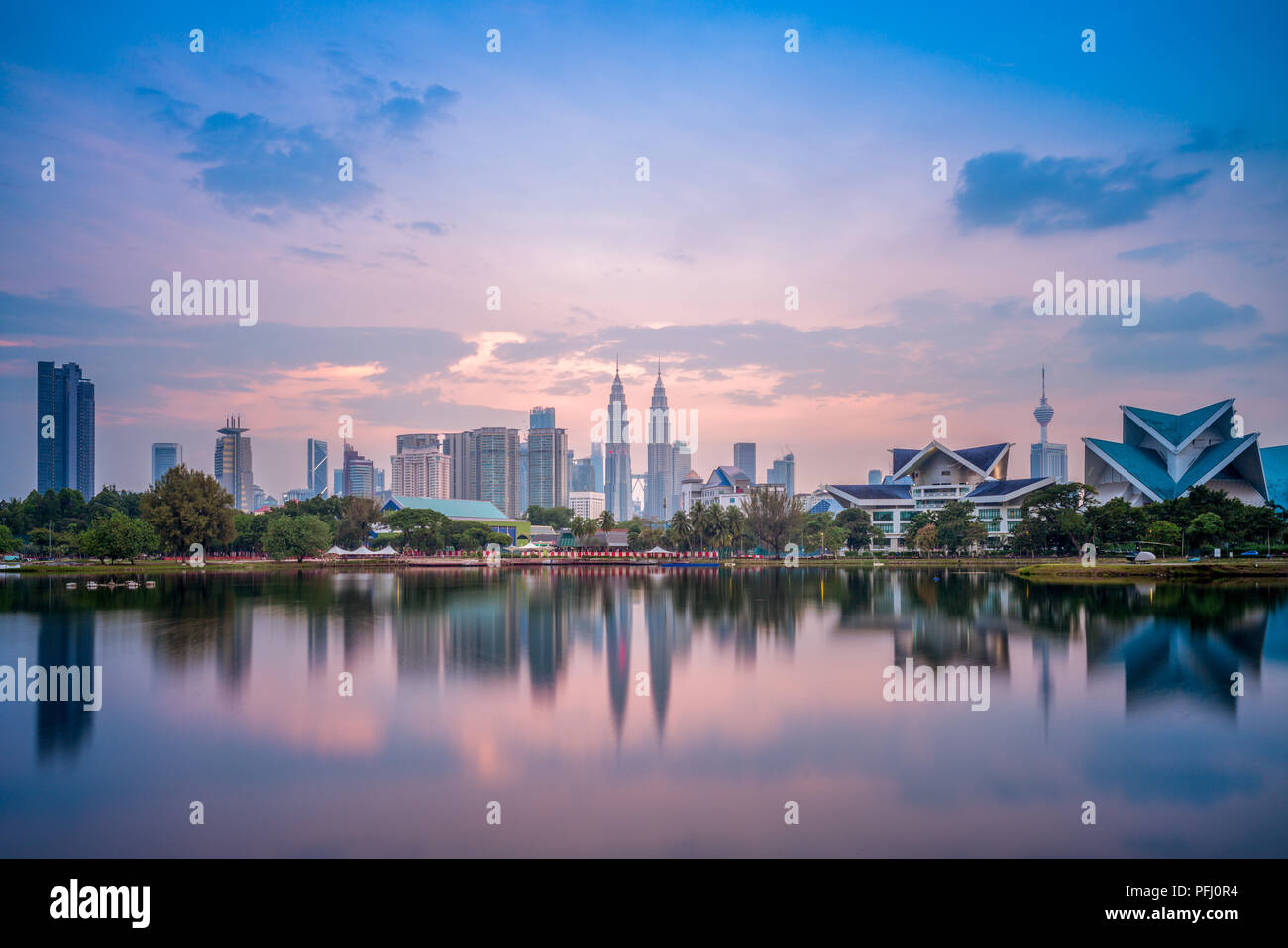 Skyline of Kuala Lumpur by the lake at dusk Stock Photo Alamy