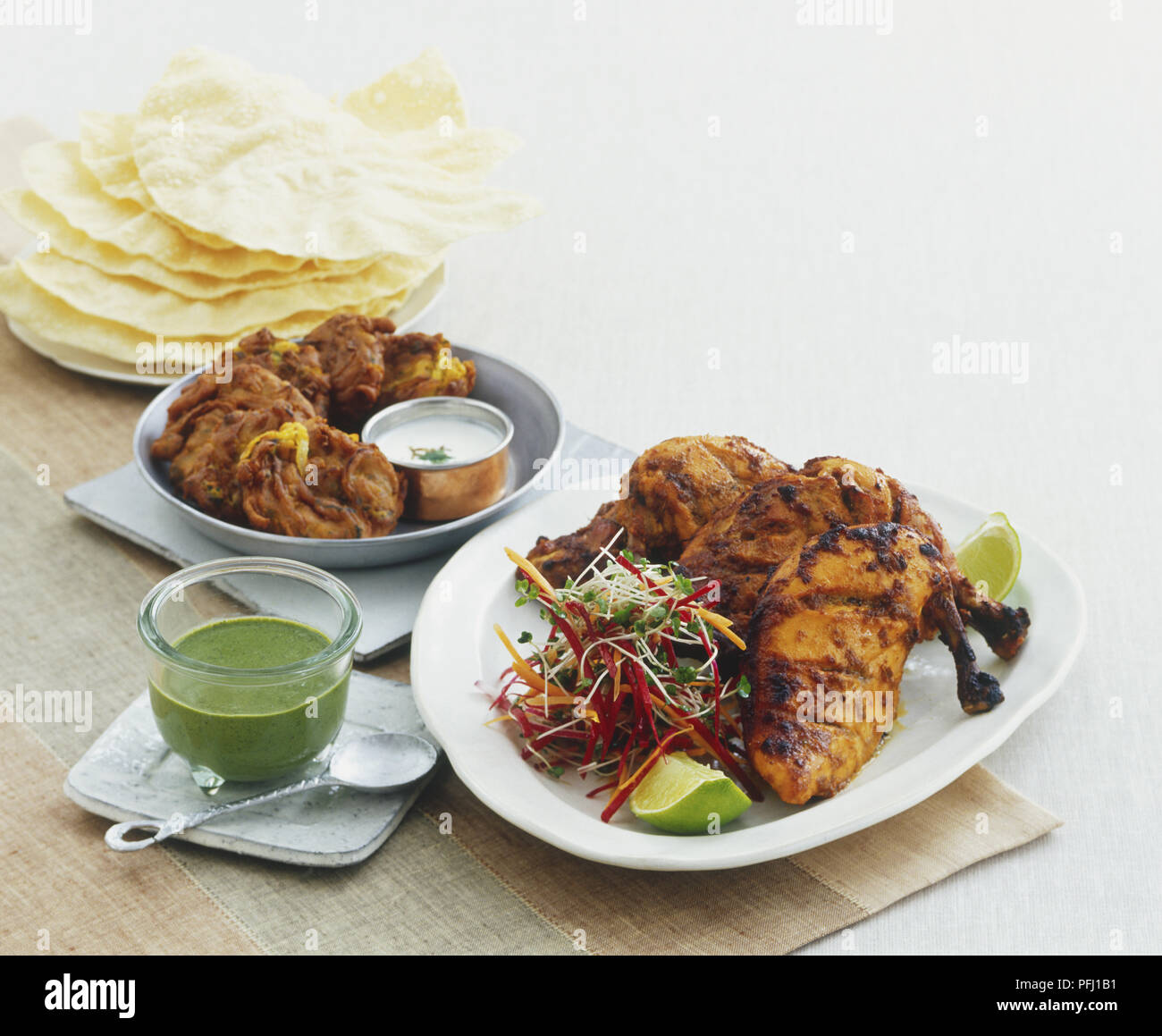 Tandoori Chicken Cucumber Dip Raita And Deep Fried Onion Bhajis