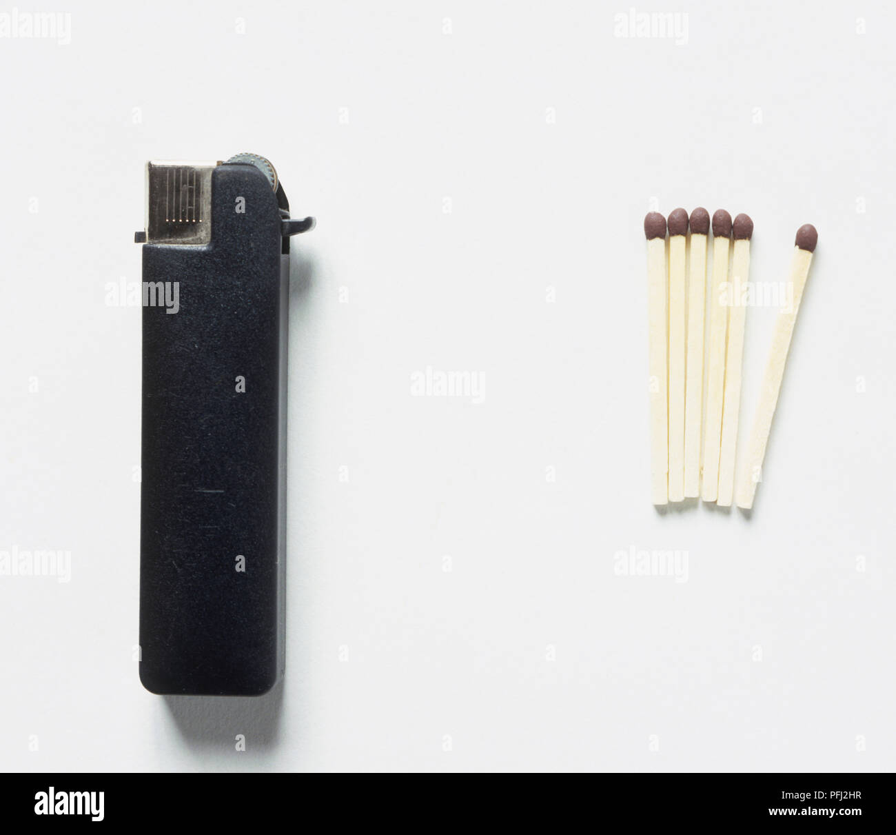 Six matches and a lighter Stock Photo Alamy