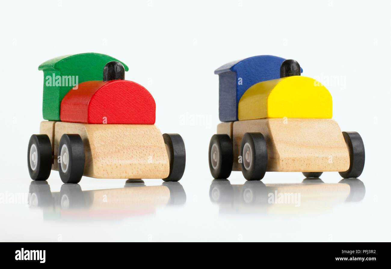 Two toy trains made from coloured blocks Stock Photo - Alamy